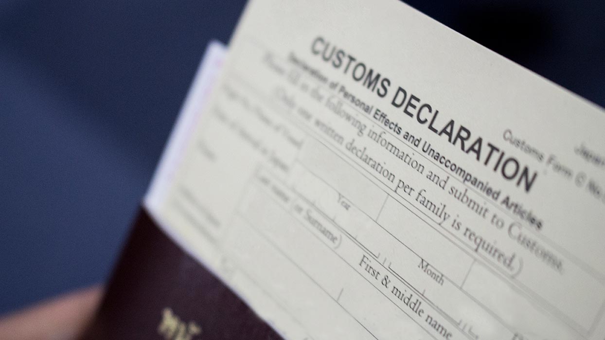 a blurred photos of customs declaration